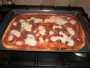 Pizza con salsiccia mozzarella e zucchine speck (Ciambella)
