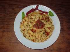 Malloreddus al pesto di pomodori secchi e pinoli